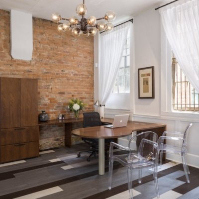 office area with a desk and chairs